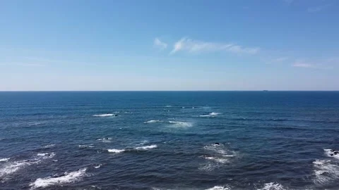 Aerial Drone View - Ocean, Waves and Golden Sand at the Beach on a Sunny Day Stock Footage 152595233