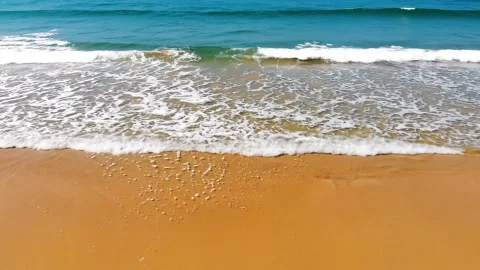Aerial Drone View of Ocean Waves on Golden Beach Stock Footage 314805407