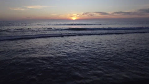 Aerial drone view of ocean waves at sunset Stock Footage 319995218