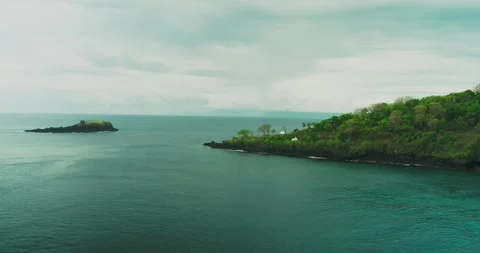 Aerial Drone View of Ocean Waves Rolling Over Tropical Beach at  Sunset 스톡 동영상 331188449