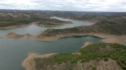 Aerial drone view of Odeleite Dam reservoir in Algarve, Portugal Stock Footage 132641723