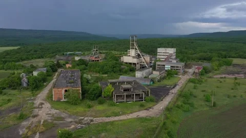 Aerial drone view of old abandoned overgrown coal mine. Stock Footage 263028190