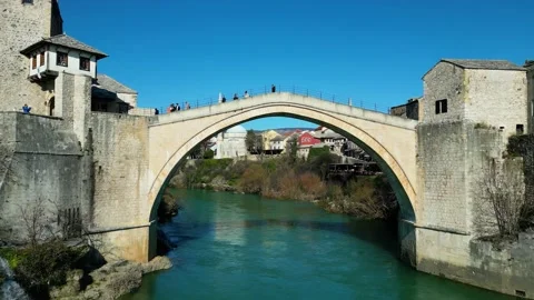 Aerial drone view of the Old Bridge in Mostar city in Bosnia and Herzegovina Stock Footage 232625802