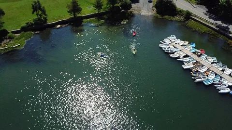 Aerial Drone view of old dock road and some kayakers 動画素材 92965990