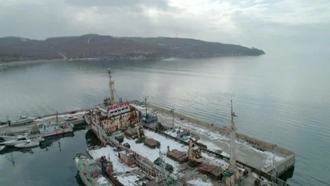 Aerial drone view of an old rusty ships moored in the harbor. Abandoned ships Video stock 146528909