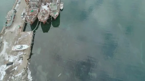 Aerial drone view of an old rusty ships moored in the harbor. Abandoned ships 스톡 동영상 146529103