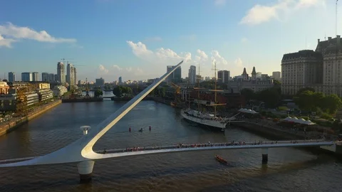 Aerial drone view of old ship Sarmiento Frigate and Woman's Bridge on Puerto Stock Footage 104887104