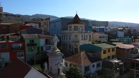 Aerial drone view of an old statue monument and authentic colorful houses and Stock Footage 105871749