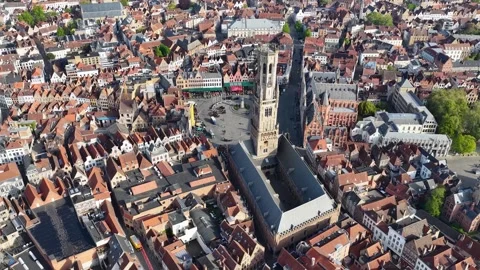 Aerial drone view of the old town of Bruges in Belgium, with the towers Stock Footage 334522299