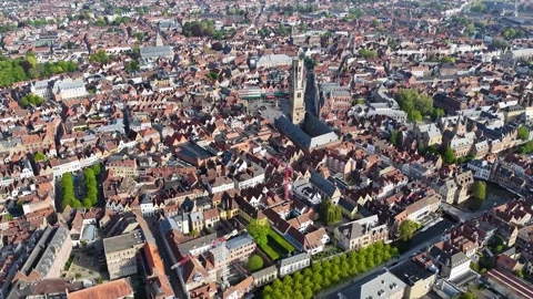 Aerial drone view of the old town of Bruges in Belgium, with the towers Stock Footage 342700178