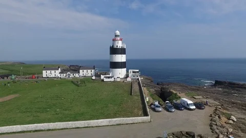 Aerial drone view of the oldest working lighthouse in Ireland Stock-Footage 95155769