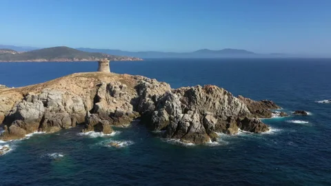Aerial drone view of the Omigna Tower of Cargese, in Corsica Video stock 171766568