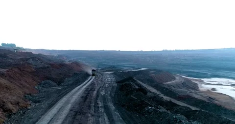 Aerial Drone View of Open Pit Coal Mine with Heavy Machinery, India Stock Footage 340950917