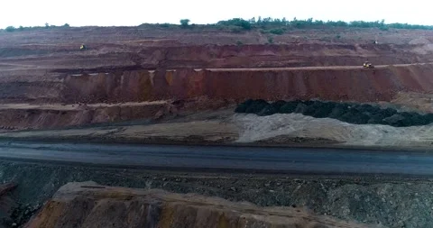 Aerial Drone View of Open Pit Coal Mine with Heavy Machinery, India Stock Footage 340951037