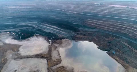 Aerial Drone View of Open Pit Coal Mine with Heavy Machinery, India Stock Footage 340951223