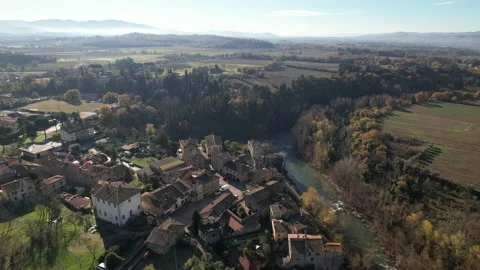 Aerial drone view orbit-Arno river Giovi Village Tuscany Italy Stock Footage 167134562