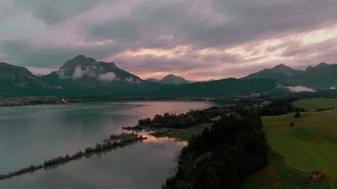 Aerial Drone View Over Alpine Lake and Mountains at Dusk, Wide Shot Видео 341446509