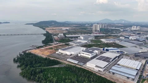 Aerial drone view over Batu Kawan industrial park coastline Stock Footage 332098430