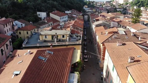 Aerial drone view over a big town in the mountains. Tuscany, Italy Stock Footage 114960970