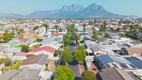 Aerial Drone View Over Cape Flats Suburb With Table Mountain Backdrop, Cape Town Stock Footage 346653871