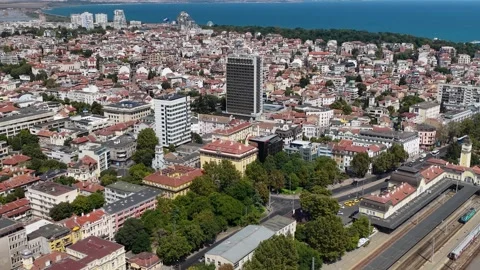 Aerial drone view over central Burgas, Bulgaria, featuring the railway station Stock Footage 346746855