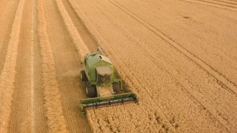 Aerial drone view over Combine harvester at night Stock Footage 109446924