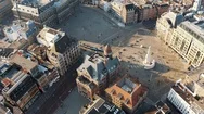 Aerial Drone View Over Dam Square In Downtown Amsterdam, Netherlands. Pan Stock Footage
