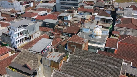 Aerial drone view over a dense residential neighborhood in Malang, Indonesia Stock Footage 345395902
