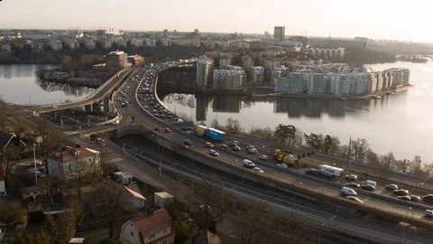 Aerial drone view over E4 Essinge highway in Stockholm at sunset Vidéo 109434580