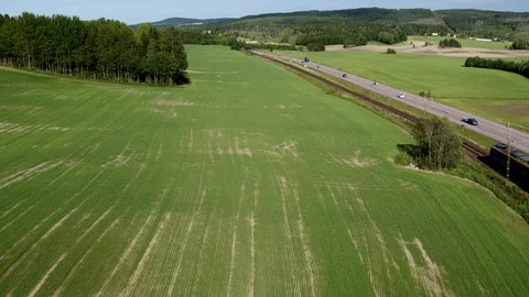 Aerial drone view over E4 train and cars Vídeo Stock 109587490