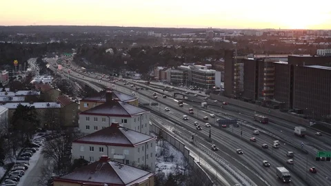 Aerial drone view over E4 in Stockholm at sunset Vidéo 111351960