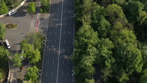 Aerial drone view over empty city street due to covid-19 pandemic quarantine Stock Footage 128713916