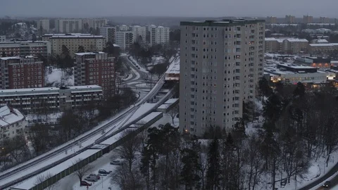 Aerial drone view over Förort in Stockholm in winter at night 動画素材 111352489