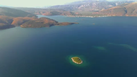 Aerial drone view over a group of islands in Galaxidi greece Stock Footage 140515823