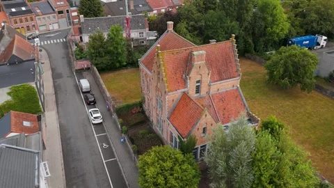 Aerial drone view over the historic Pastorie house in Ledegem, West Flanders Stock Footage 336569850