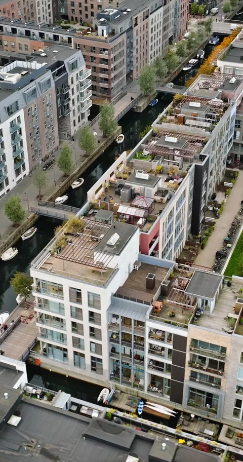Aerial drone view over modern apartment complex with canal and riverside wa.. Stock Footage 339766376