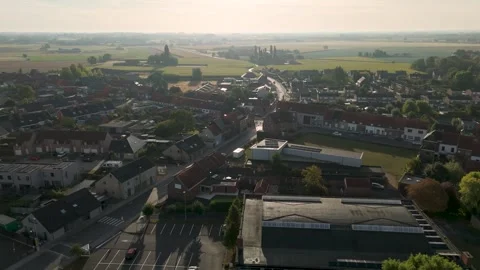 Aerial drone view over the northeastern part of Ledegem town in West Flander Stock Footage 336569984