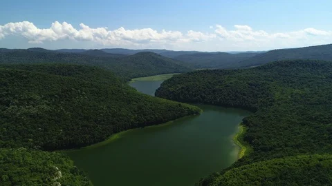 Aerial drone view over river and mountain forest. Amazon jungle. Stock Footage 111412711