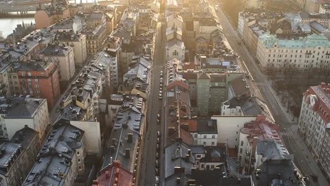 Aerial drone view over Rooftops in Stockholm at sunset 動画素材 110096836