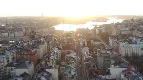 Aerial drone view over Rooftops in Stockholm at sunset Vidéo 111353026