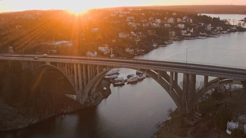 Aerial drone view over Skuru bridge in Stockholm at sunset Stock Footage 109483490