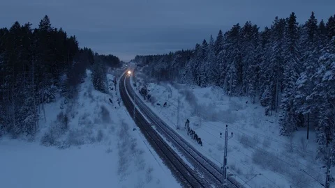 Aerial drone view over Train in winter at night Stock Footage 109557396