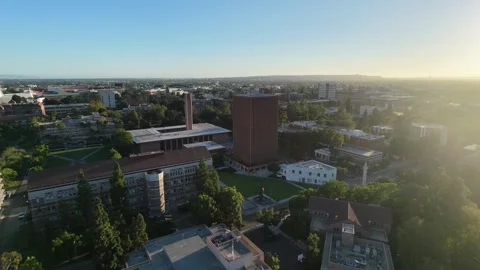 Aerial Drone View Over USC Campus During Golden Hour in Los Angeles, CA Видео 340657156