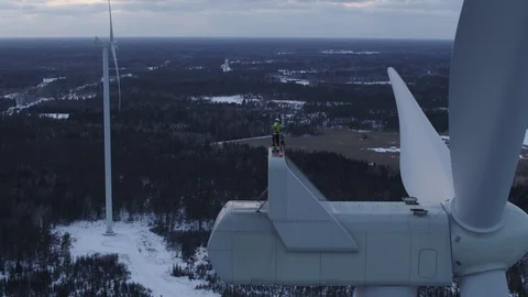 Aerial drone view over Wind Turbine at sunset Vídeo Stock 111352744