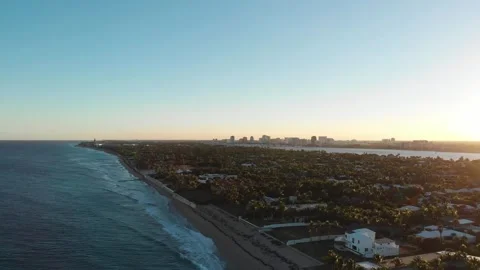 Aerial drone view of Palm Beach coastline at golden hour Florida Video stock 330950659