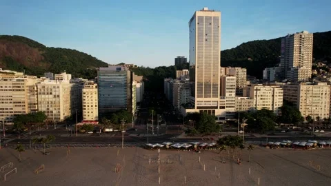 Aerial drone view panning Avenida Atlantica in Copacabana, Rio de Janeiro Stock Footage 231123620