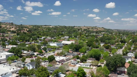 Aerial drone view of Paso Robles California suburb - homes, trees, hills 01 Stock Footage 308422934