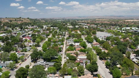 Aerial drone view of Paso Robles California suburb - homes, trees, hills 03 Stock Footage 308422996