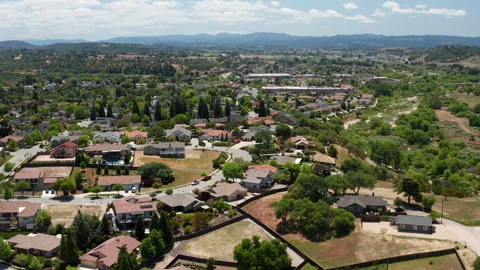 Aerial drone view of Paso Robles California suburb - homes, trees, hills 07 Stock Footage 308423559
