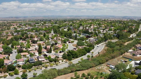 Aerial drone view of Paso Robles California suburb - homes, trees, hills 04 Stock Footage 308423955